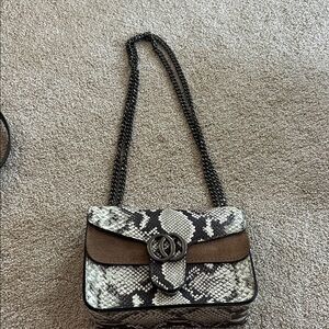 Snakeskin small purse purchased in Italy
